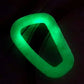 Glowing green polymer D-ring carabiner bracelet emitting vibrant neon light