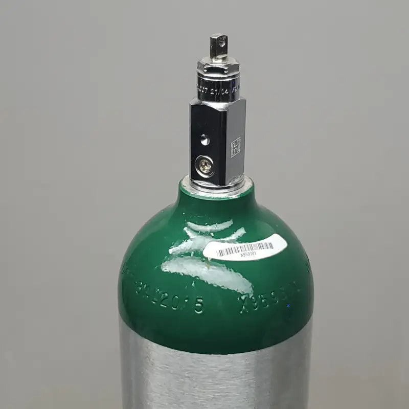 Green and silver medical oxygen cylinder with black post valve regulator for HARRISON tank