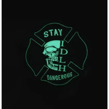 Glowing green skull design in Maltese cross on PVC Glow Patch with Stay Dangerous text