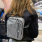 Grey canvas mini-backpack with zippered compartments for Avenger Concealment Gun Pack