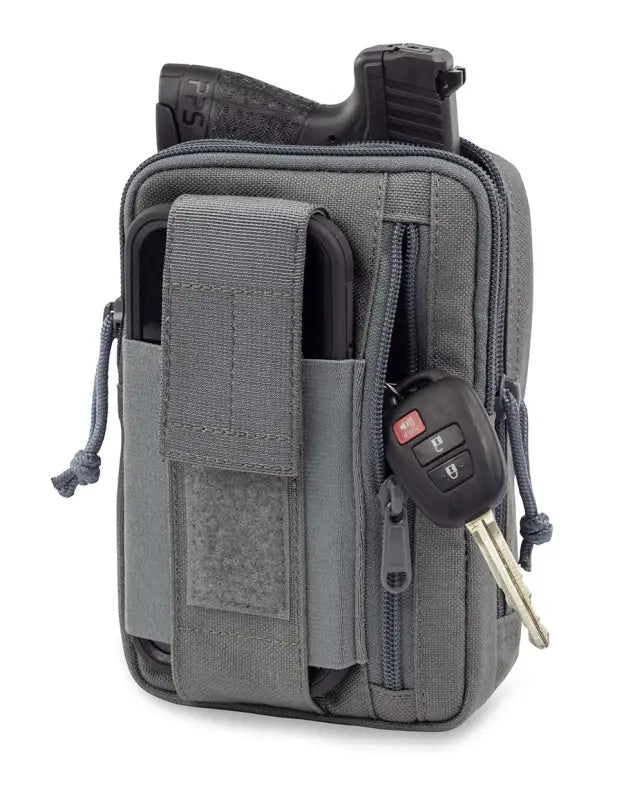 Grey tactical utility pouch for Liberty Gun Pack with compartments and key attachment