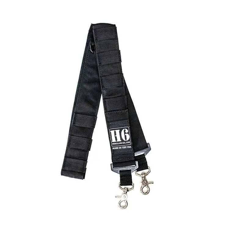 Black padded firefighter radio strap with metal clips for secure equipment use