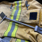 Halligan tool on firefighter gear showcasing the 12’’ XL Ti Hooligan Forced Entry Tool