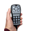 Hand holding Whelen HHS3200 handheld siren and controller for emergency response