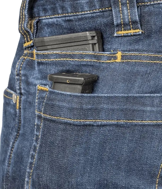 Handgun magazine in pocket of Asset Tactical Jeans for discreet carry in tactical pants