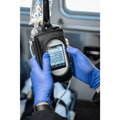 Handheld electronic device in a pump case held by blue-gloved hands for first responders