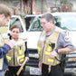 Emergency responders in HCPHES Safety Vests reviewing information together