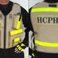 Tan HCPHES Safety Vest with reflective yellow stripes for emergency services personnel