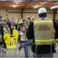 Three photos of emergency response training featuring HCPHES Safety Vest activities