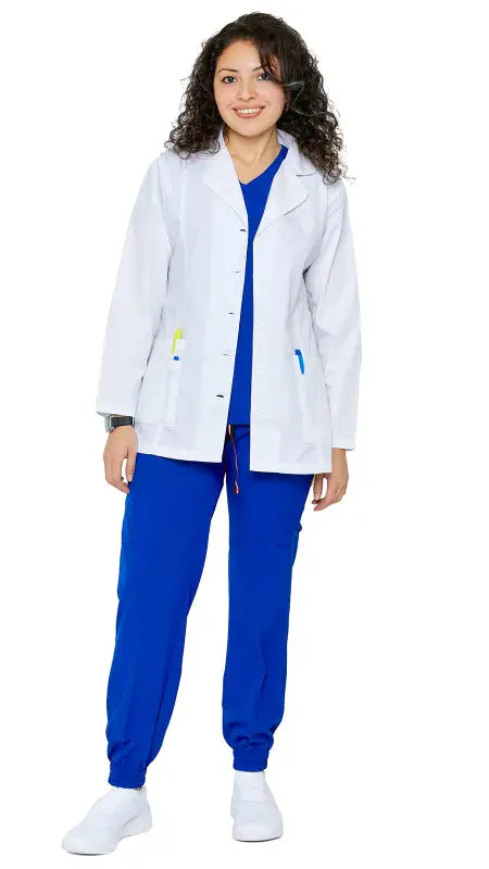 Healthcare professional in women’s princess-cut short lab coat over blue scrubs