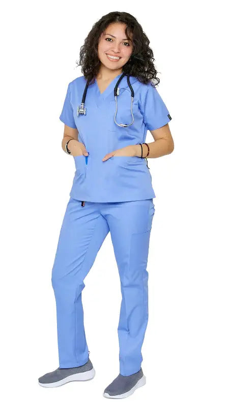 Healthcare worker in Women’s Classic 8 Pocket Uniform Scrubs with pen slot and stethoscope