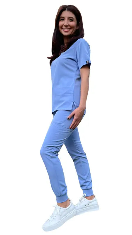 Healthcare worker in light blue jogger scrubs from Women’s 4-Way Extreme Stretch Jogger