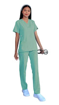 Healthcare worker in Women’s Gentle Stretch Slim Fit Zipper Set - mint green scrubs