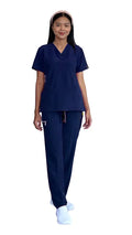 Healthcare worker in Women’s Gentle Stretch Slim Fit Zipper Set in navy blue scrubs