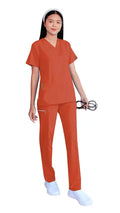 Healthcare worker in Women’s Gentle Stretch Slim Fit Zipper Set with orange scrubs
