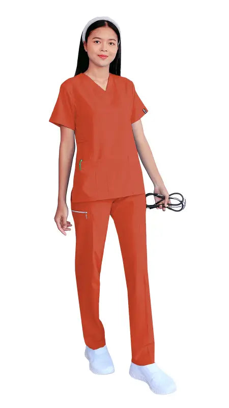 Healthcare worker in Women’s Gentle Stretch Slim Fit Zipper Set with orange scrubs