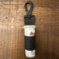 Black and white firefighter glove strap with firefighter swipe tool attachment and carabiner