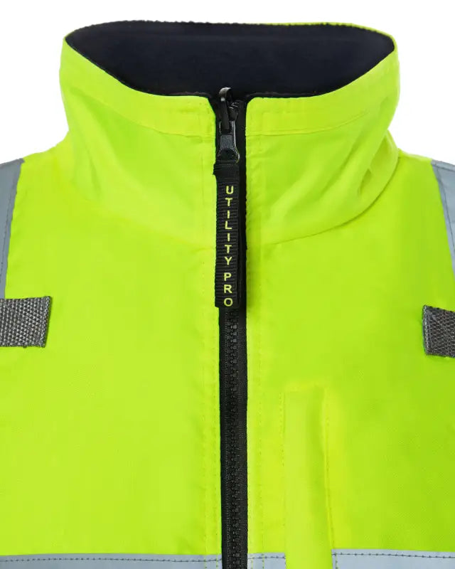 High-visibility yellow UHV1001 HiVis zip reversible insulated vest with reflective strips