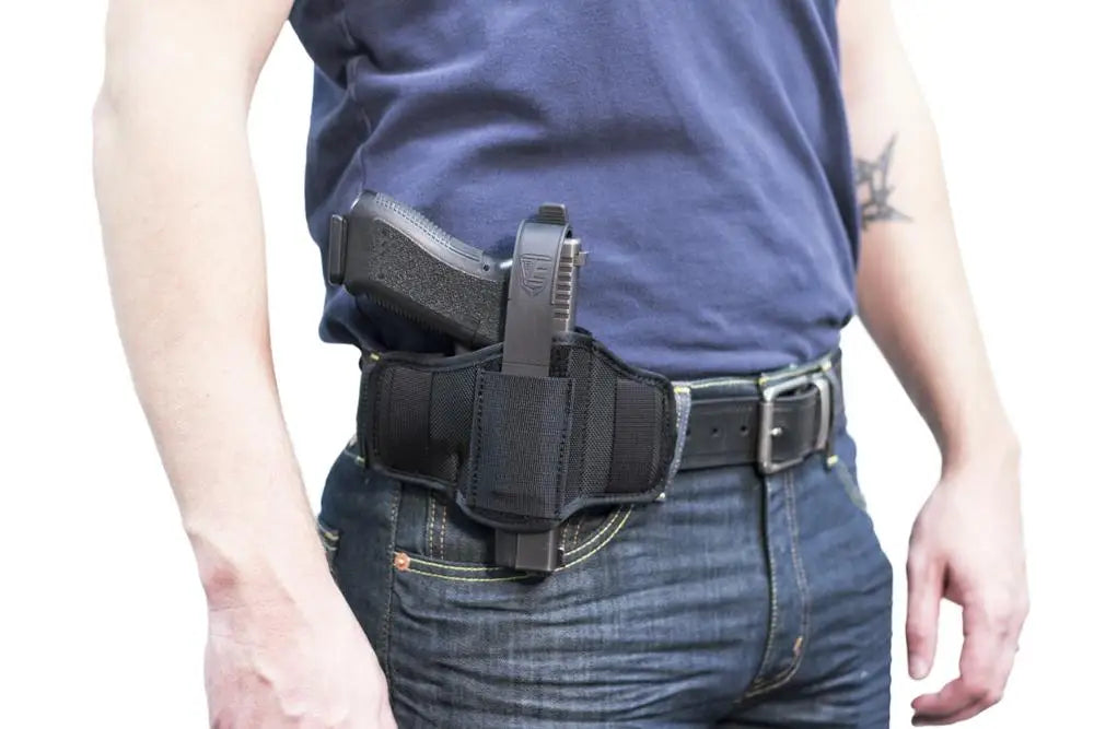 Hip holster with handgun on belt, showcasing Deep Cover Ultra Concealment Holster