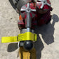 Ice climbing tool with red picks and yellow strap - FFGWS for interior firefighters