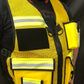 High-visibility yellow Incident Command Safety Officer reflective vest with pockets