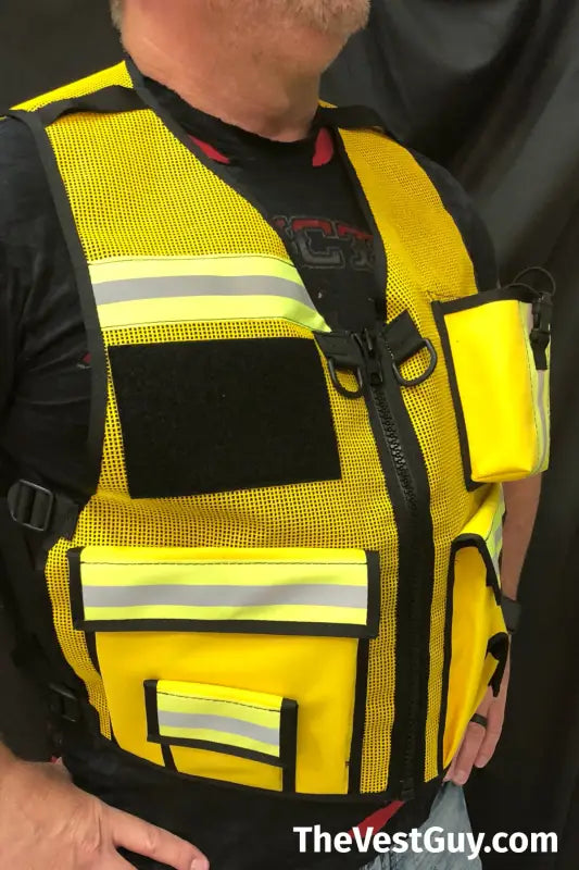 High-visibility yellow Incident Command Safety Officer reflective vest with pockets