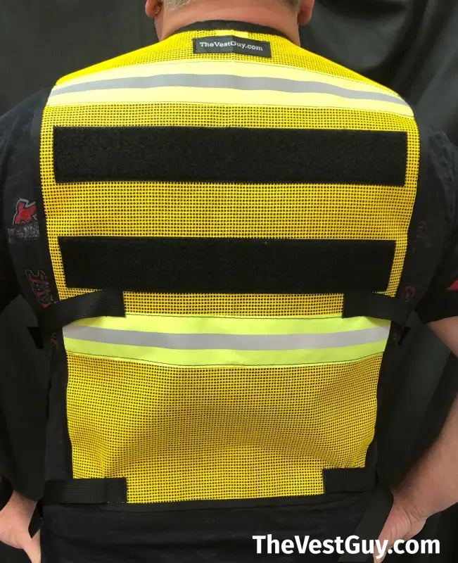 High-visibility yellow Incident Command Safety Officer reflective vest with black stripes