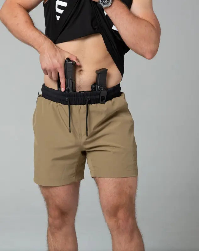 Khaki Carrier Training Shorts with concealed carry holster and retention belt from Arrowhead Tactical Apparel