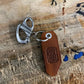 Leather keychain with metal clasp featuring 50mm quick release clip for easy attachment