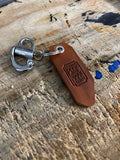 Leather keychain with metal clip featuring 50mm quick release clip for easy attachment