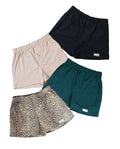 Four pairs of boxer shorts in black, beige, green, and leopard print patterns