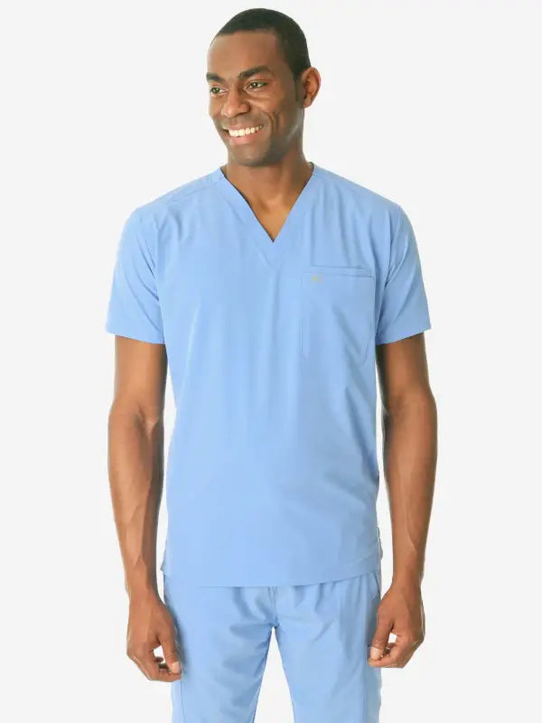 Light blue men’s double-pocket scrub uniform with v-neck top and matching pants