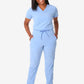 Light blue women’s tuckable one-pocket scrub top with matching pants for medical professionals