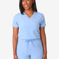 Light blue women’s tuckable one-pocket scrub top with v-neck and drawstring pants