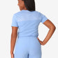 Light blue back view of Women’s Tuckable One-Pocket Scrub Top for medical professionals