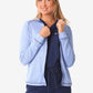 Light blue women’s scrub jacket with navy blue trim for athletic comfort