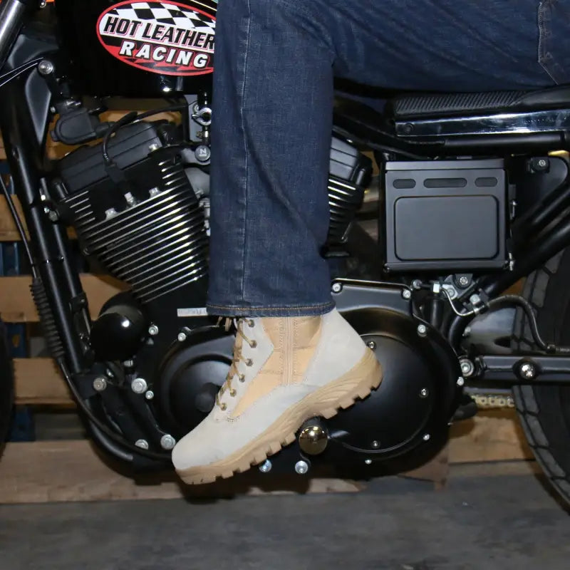 Light colored boot on motorcycle engine showcasing Hot Leathers Tan Leather Swat Style