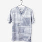 Light gray men’s duct tape scrub top with multiple pockets on a hanger