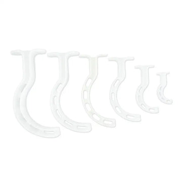 White plastic wall hooks in a row for LINE2design Berman Oral Airway Kit