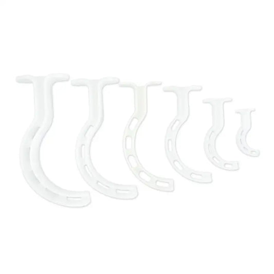 White plastic wall hooks in a row for LINE2design Berman Oral Airway Kit