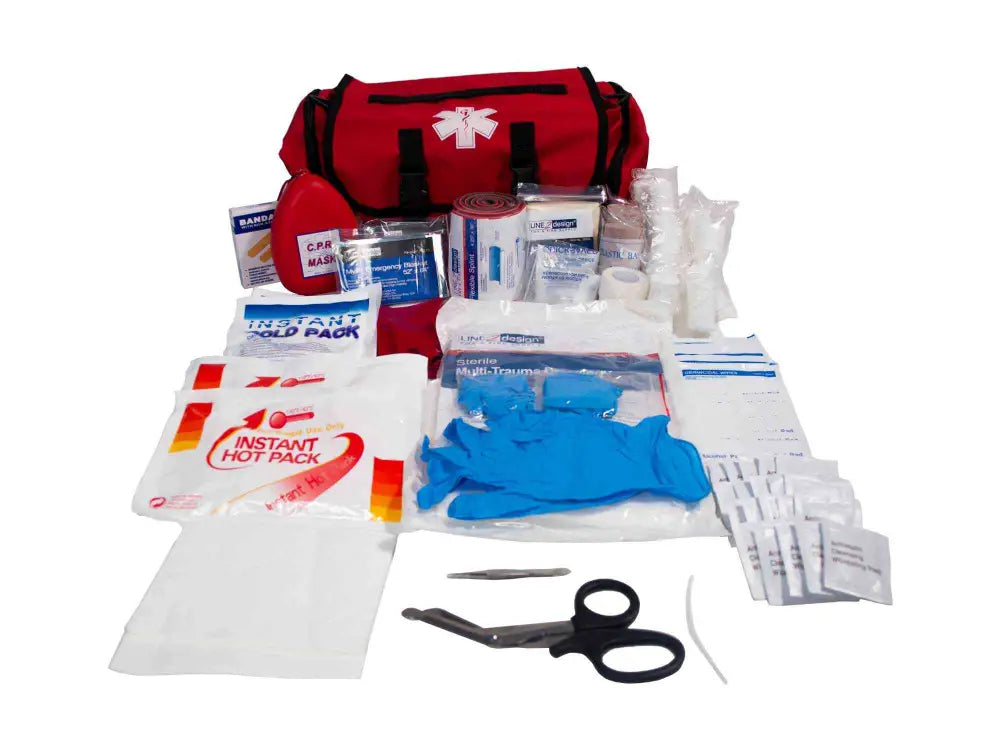 Red LINE2design Emergency Aid Responder Kit bag with medical supplies displayed