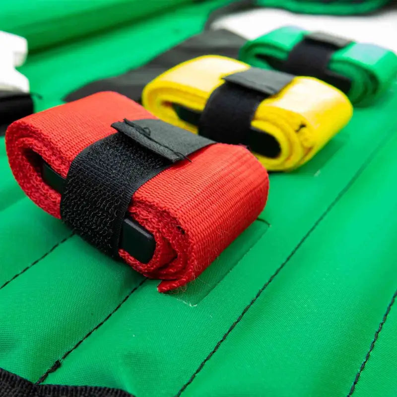 Red, yellow, and black hook-and-loop straps for LINE2design KED Extrication Device