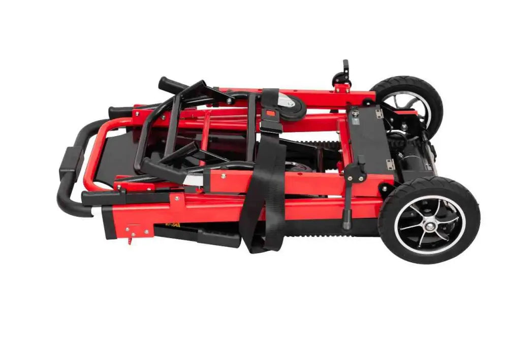 Red and black folding mobility scooter collapsed, part of Line2design Mobile Stair Lift