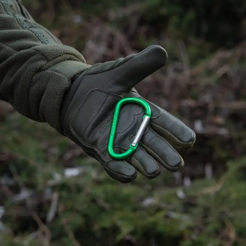 Green M-Tac Carabiner attached to a black tactical glove for first responders and firefighters