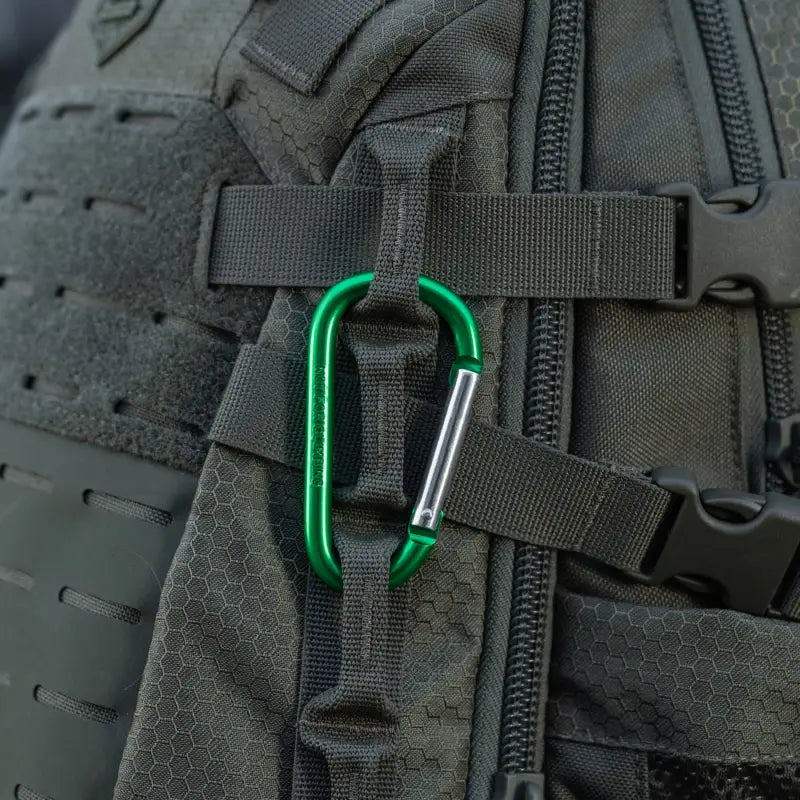 Green M-Tac Carabiner on black tactical straps for first responders and firefighters