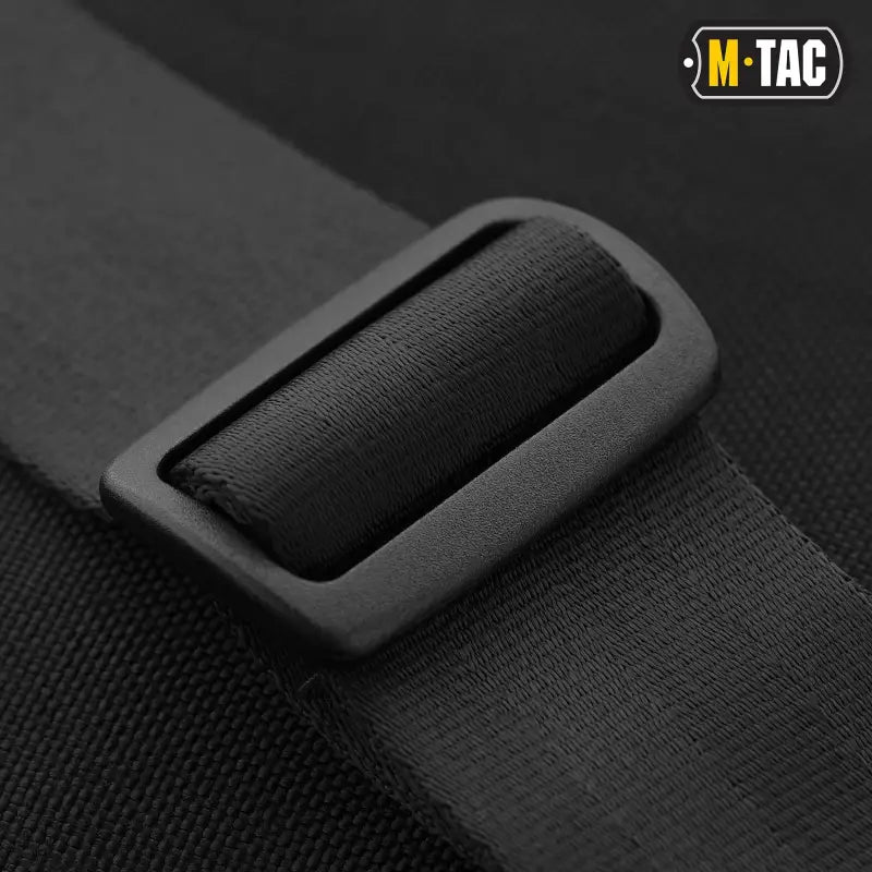 Black plastic buckle on textile material of M-Tac Concealed Carry Sling Bag Elite Gen.IV