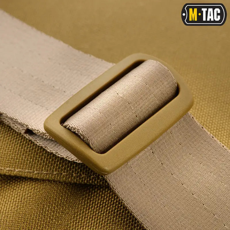 Tan tactical belt buckle featuring M-TAC branding for M-Tac Concealed Carry Sling Bag Elite Gen.IV