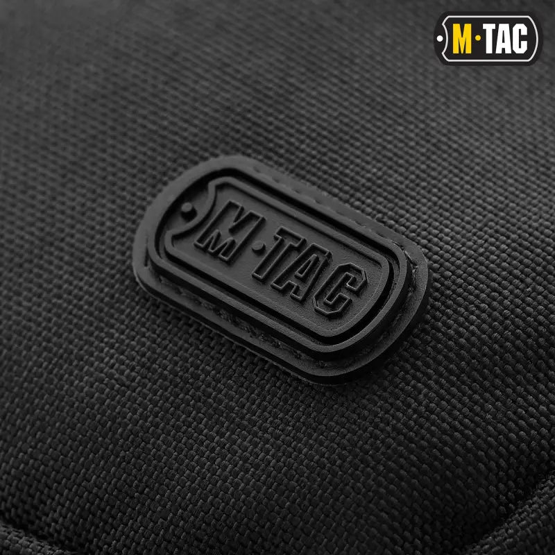 Black M-TAC logo patch on Concealed Carry Sling Bag Elite Gen.IV with loop panel