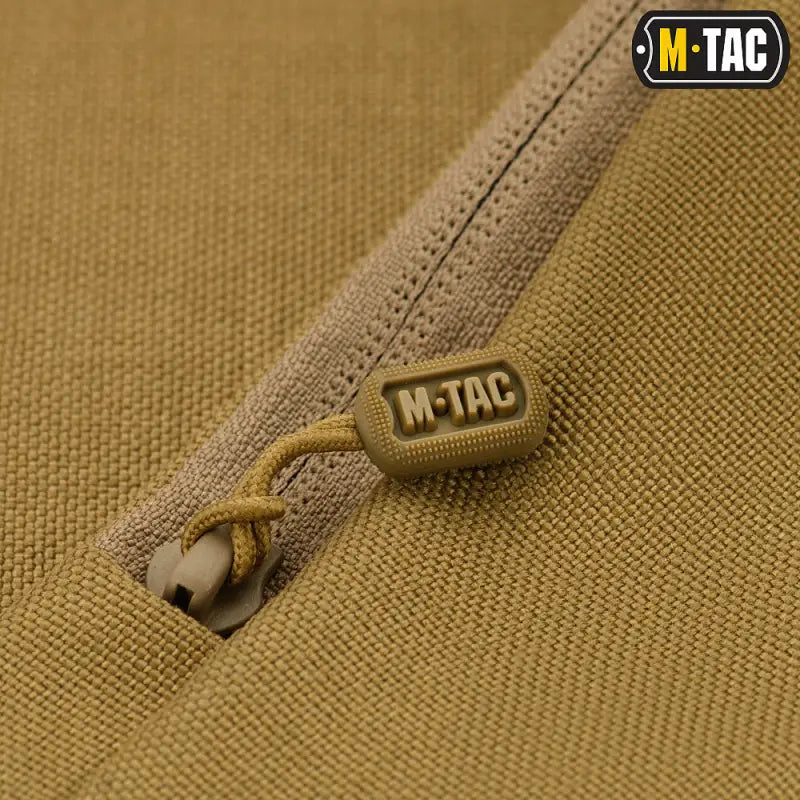 Tan zipper pull with M-TAC branding on M-Tac Concealed Carry Sling Bag Elite Gen.IV