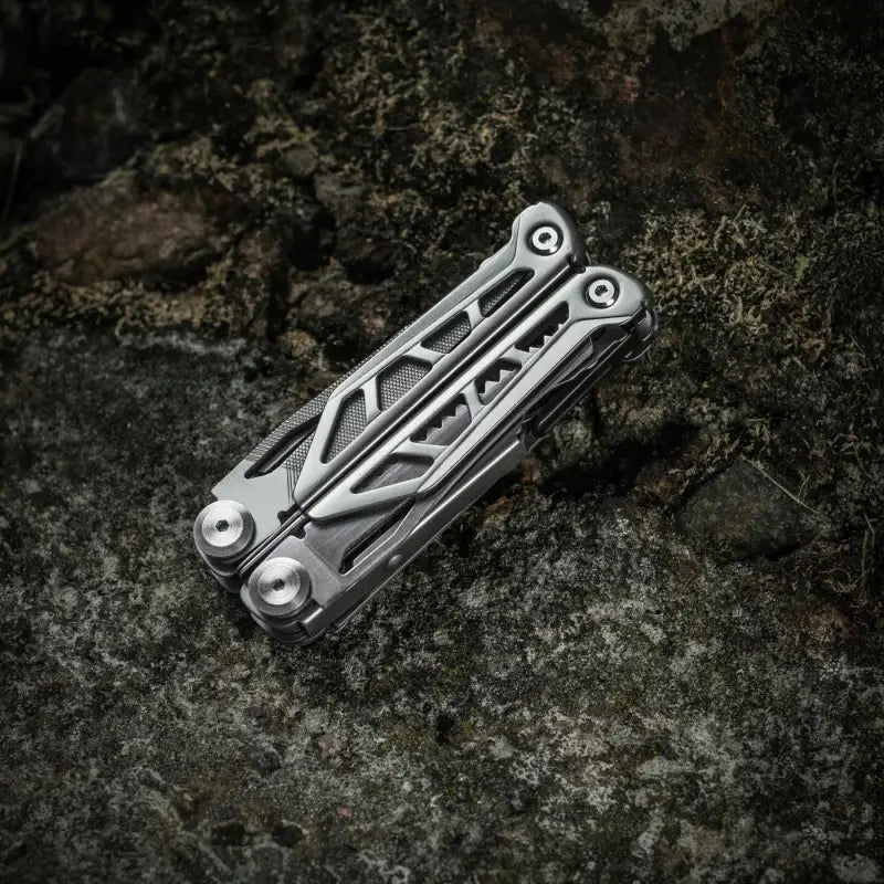 Silver M-Tac Multitool Type 3 Grey with butterfly-style handles in closed position